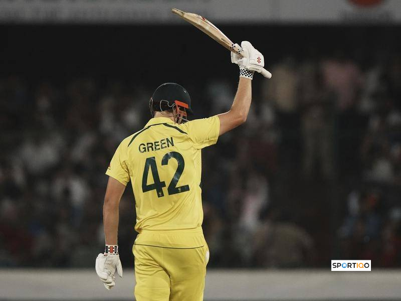 Cameron Green raising his bat after a fifty against India in T20I.