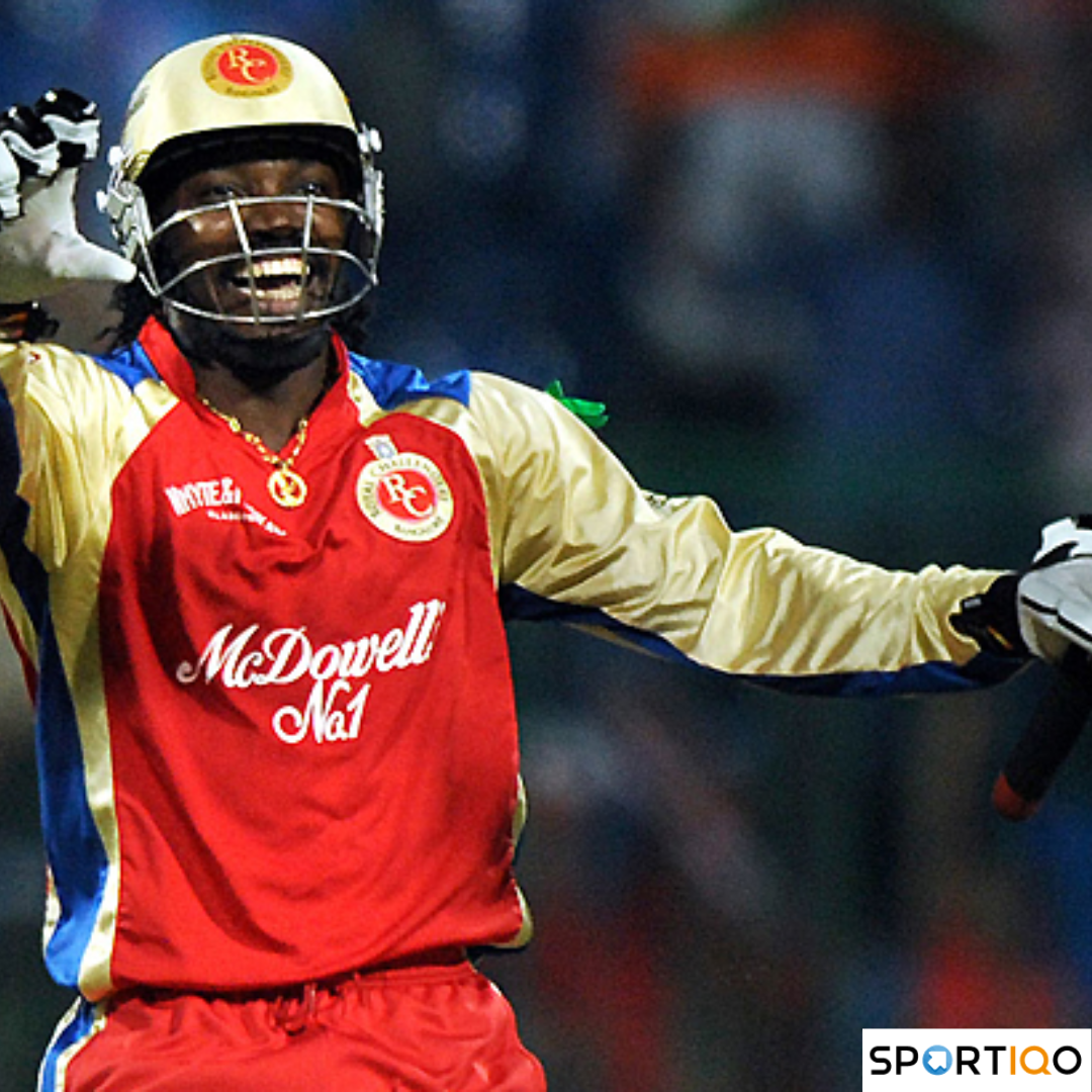 Chris Gayle celebrates his hundred