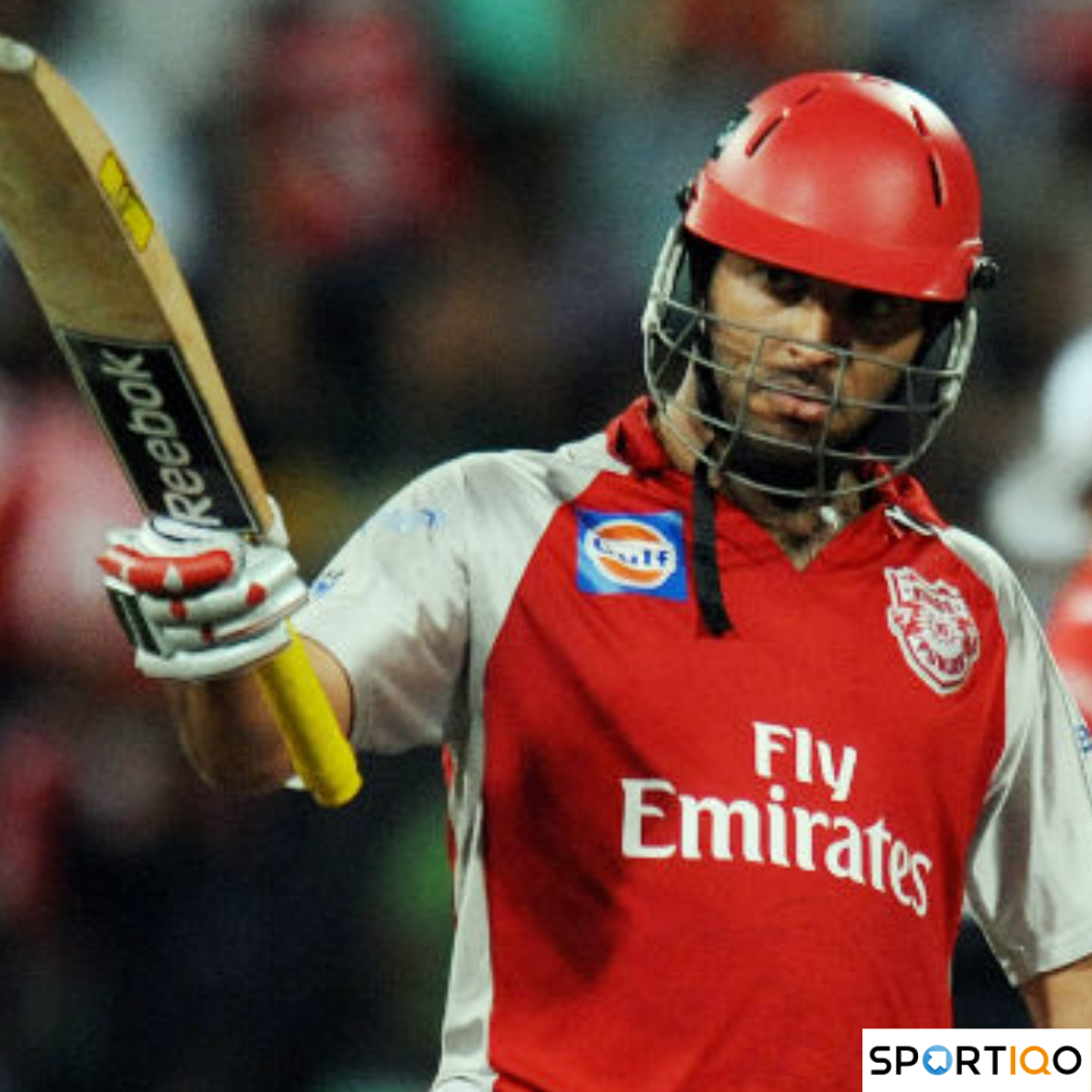 Yuvraj Singh raises bat after reaching his fifty