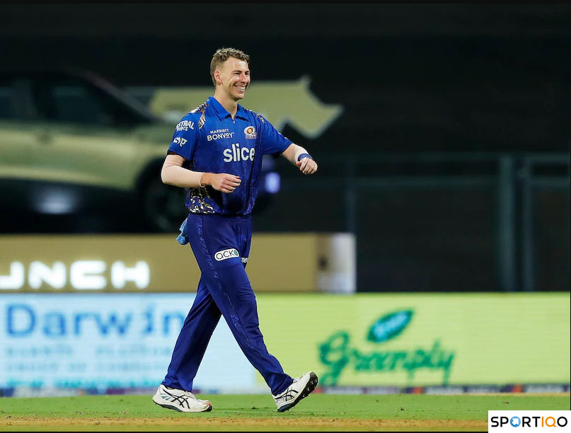 Riley Meredith celebrating the wicket.