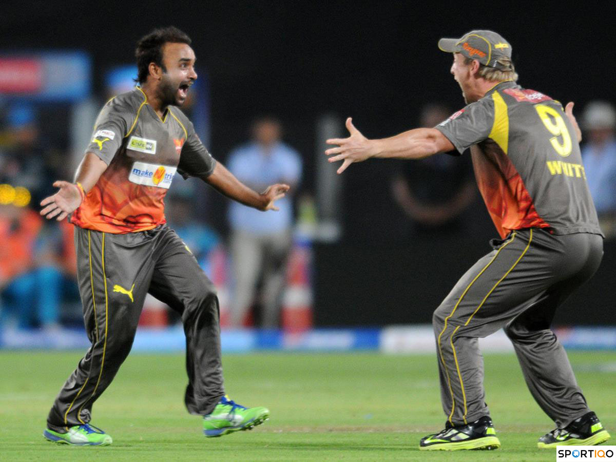  Amit Mishra celebrating his IPL hat-trick with teammate Cameron White