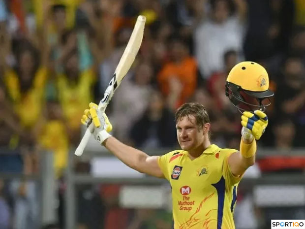 Shane Watson raising his bat after scoring a century for CSK in IPL.