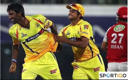 Lakshmipathy Balaji celebrating with Suresh Raina after a wicket