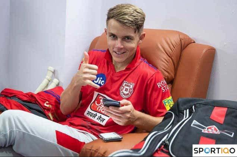 Sam Curran sitting on Sofa