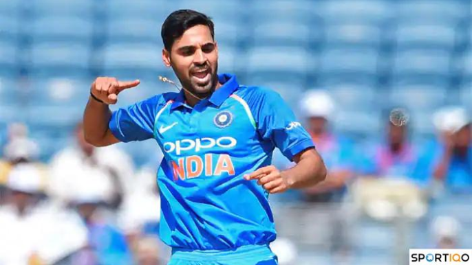 Bhuvneshwar Kumar bowling in his team jersey