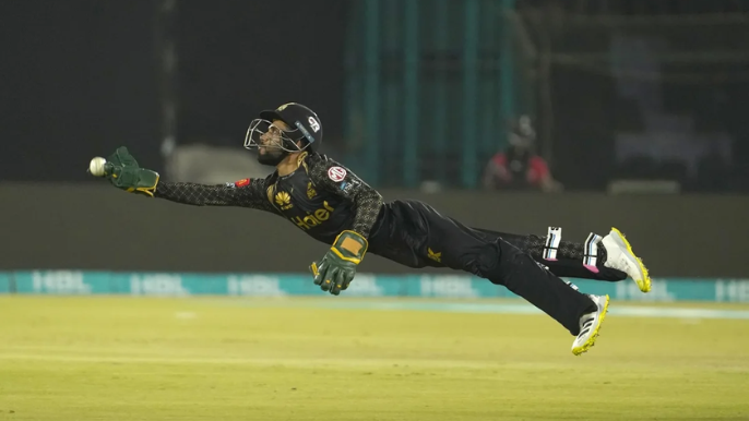 Mohammad Haris makes an acrobatic fielding effort